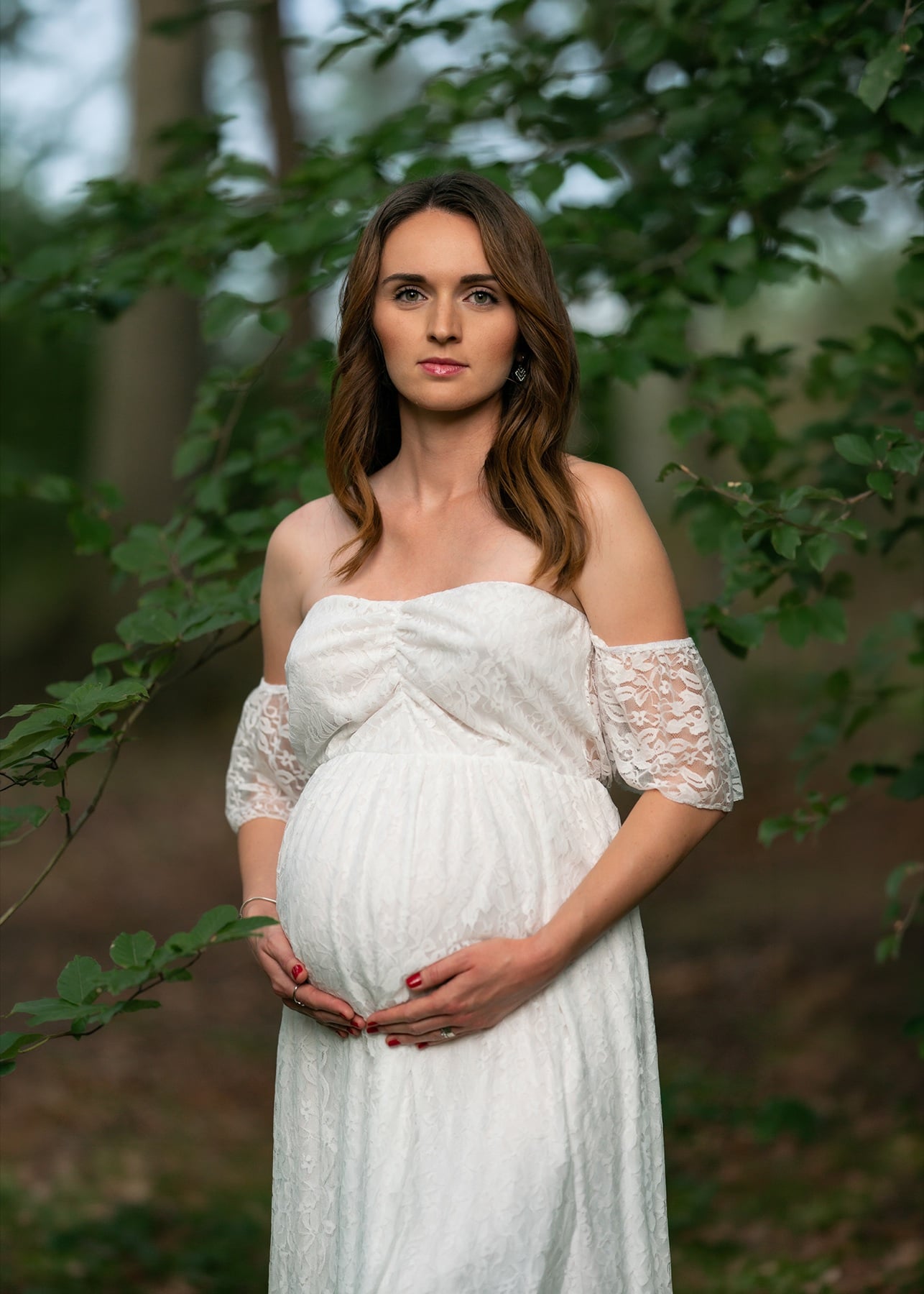 Natural light maternity portrait outdoors, straight out of camera